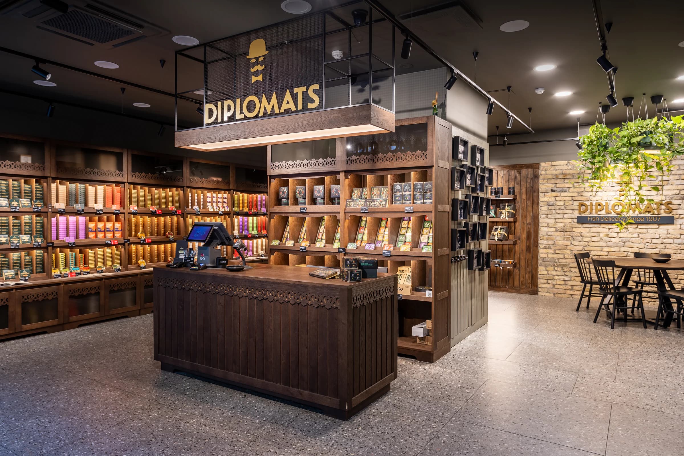 Interior of the Diplomats store in Riga with wooden displays, a central counter and tasting area