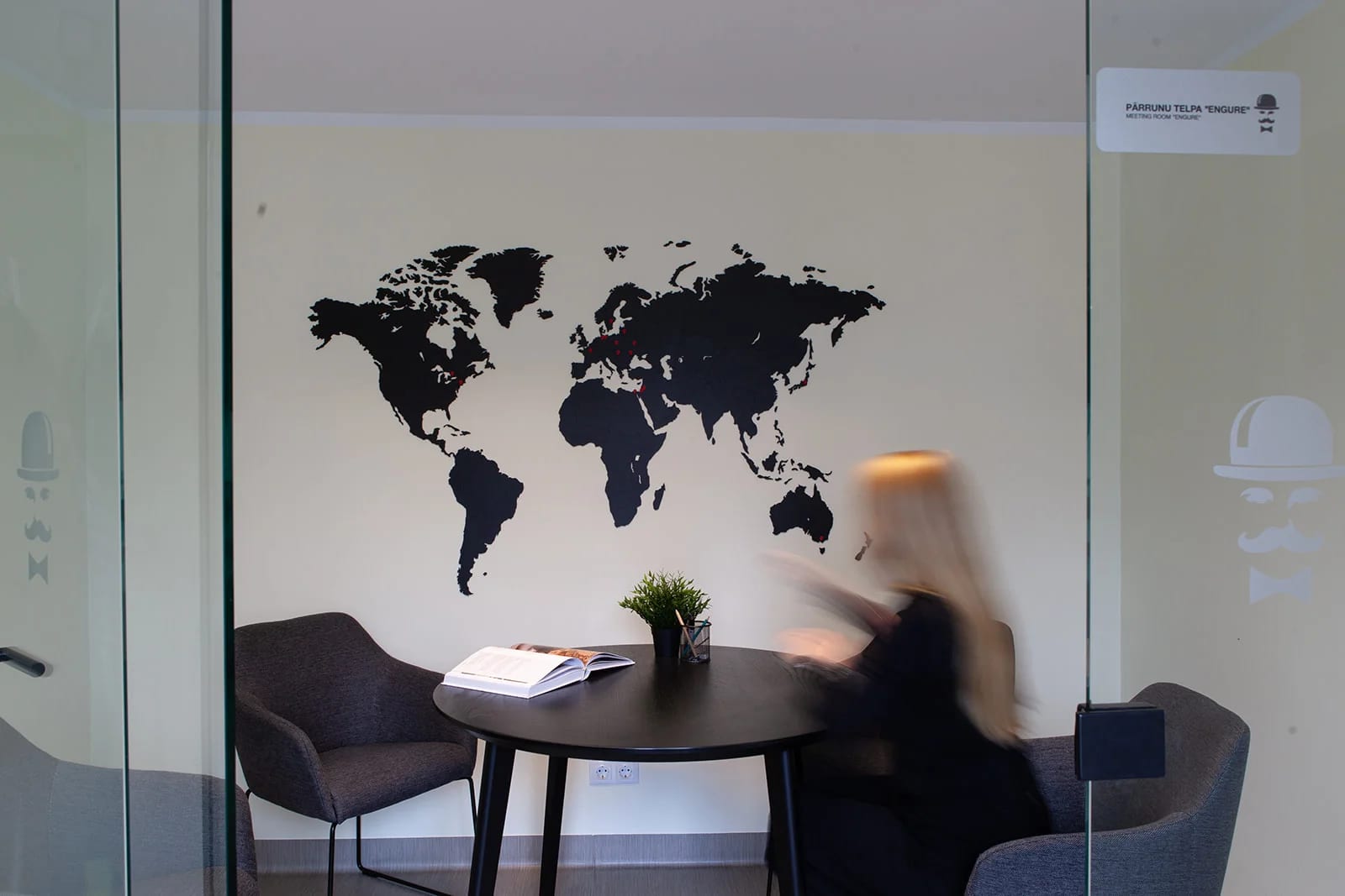 The Engure meeting room at SIA Unda, with a round table and a world map on the wall